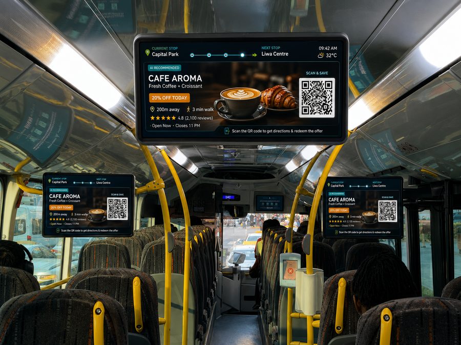 Bus interior screen showing next stop, ETA and a nearby café offer 200m away with a QR code